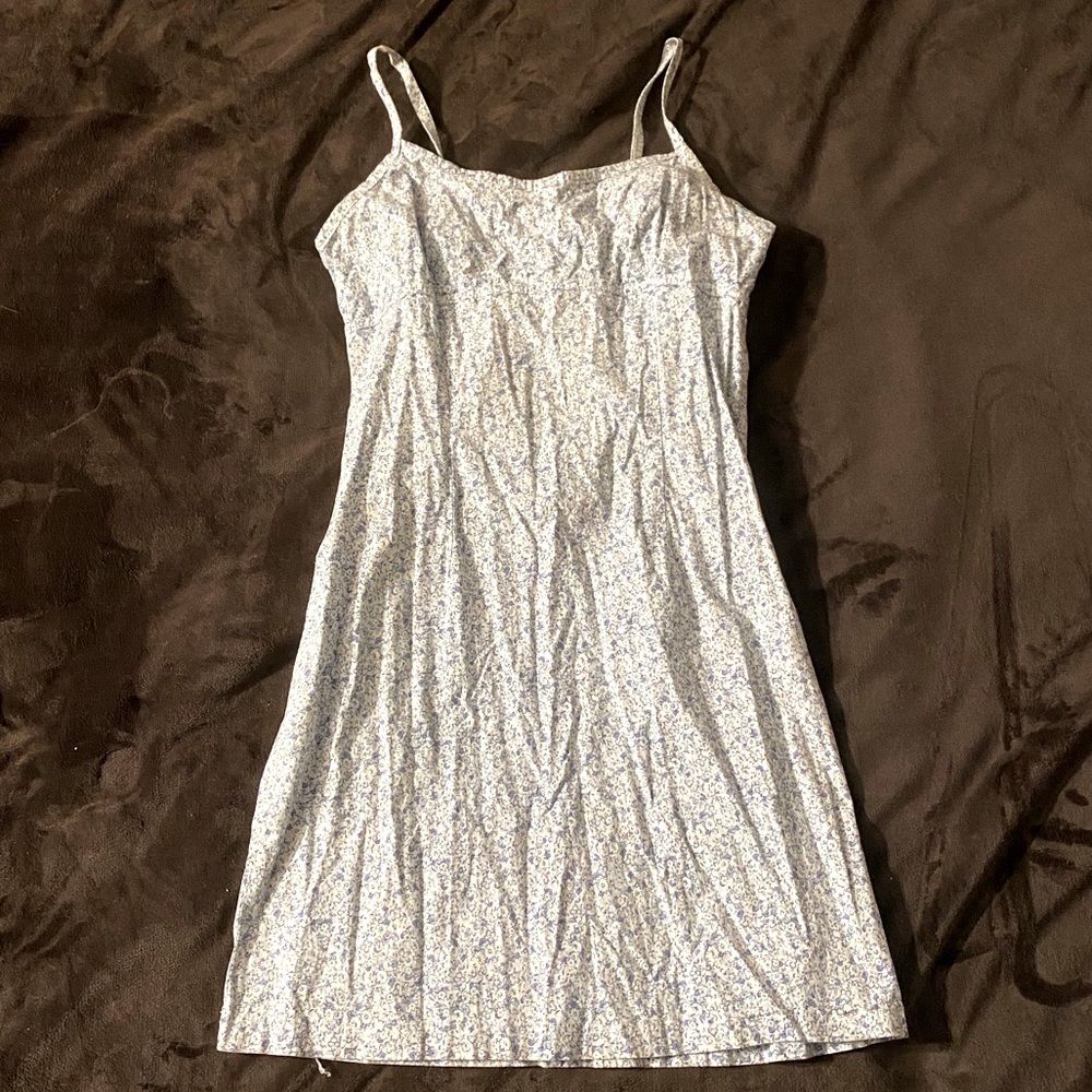 Mini dress with little blue flowers all over it